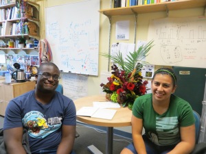 Undergraduates Julian Duodu and Stephanie Montenegro taking a pause from reading and brainstorming about their project